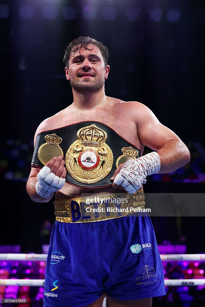 Dave Reed Boxing Dave Allen celebrates with his belt after victory by knock out in the ...