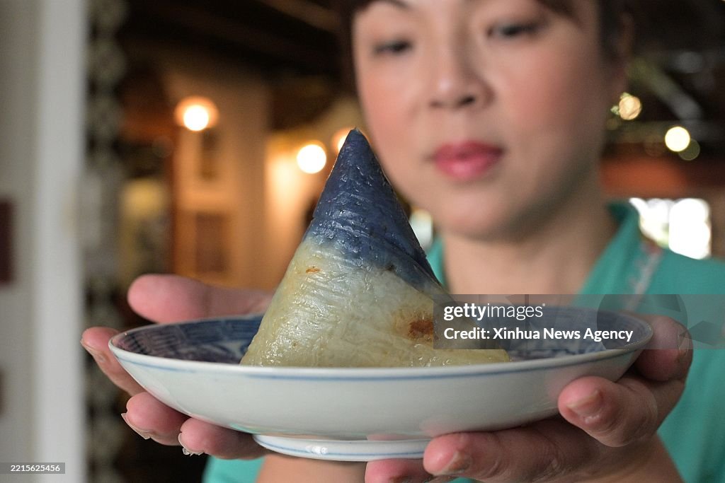 Intan Rice Nyonya Cheryl Yapp shows Nyonya rice dumplings at the Intan, a... News ...