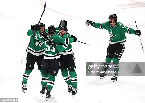 Thomas Harley of the Dallas Stars celebrates with Cody Ceci, Tyler Seguin and Mason Marchment after scoring the game winning goal in overtime to win...