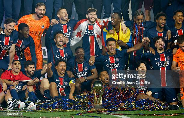 Players of PSG celebrate during the Ligue 1 trophy ceremony following the Ligue 1 football match between Paris Saint-Germain and AJ Auxerre at Parc...