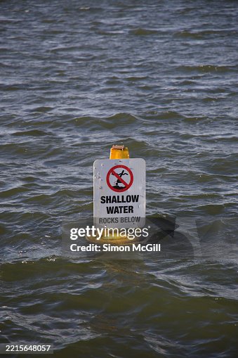 Missisuaga Floating Warning Sign Shallow Water Rocks Below Warning Sign On A Buoy Floating In Lake ...
