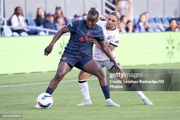 Racheal Kundananji of Bay FC defends the ball from Gisele Thompson of Angel City FC during a game between Angel City FC and Bay FC at PayPal Park on...