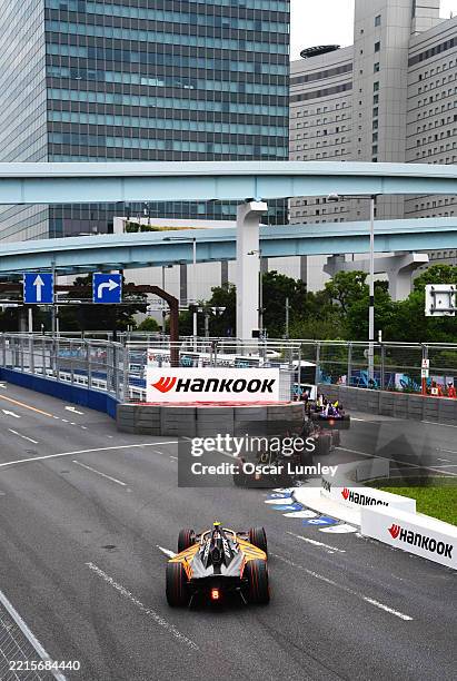 Jean-Eric Vergne of France driving the DS Penske DS E-Tense FE25 leads Taylor Barnard of Great Britain driving the NEOM McLaren Formula E Team Nissan...