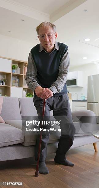 asian elderly difficulty movements home - muscle weakness stock pictures, royalty-free photos & images