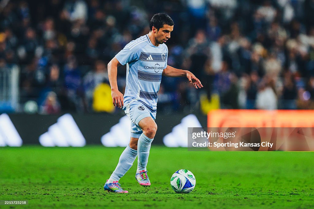 Shapi 394 Shapi Suleymanov of Sporting Kansas City runs with the ball during ...