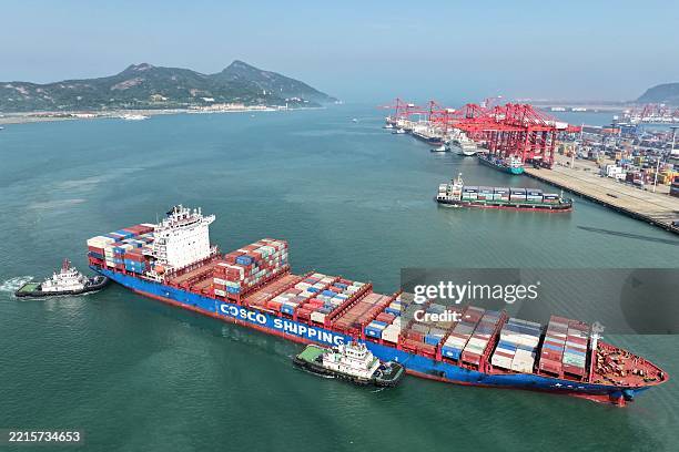 Container ship arrives at the port in Lianyungang, in China's eastern Jiangsu province on May 21, 2025. / China OUT