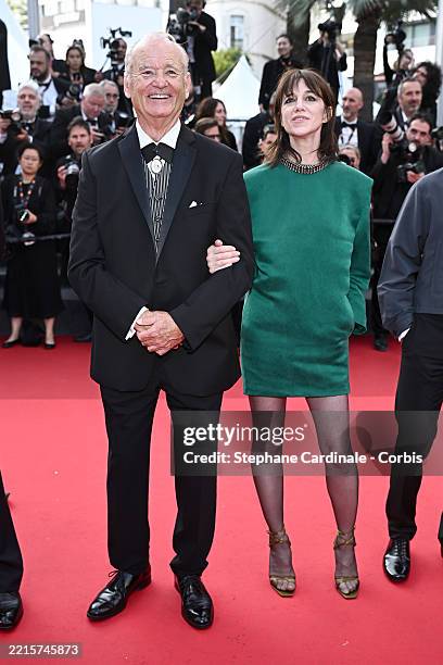 Bill Murray and Charlotte Gainsbourg attend the "The Phoenician Scheme" red carpet at the 78th annual Cannes Film Festival at Palais des Festivals on...