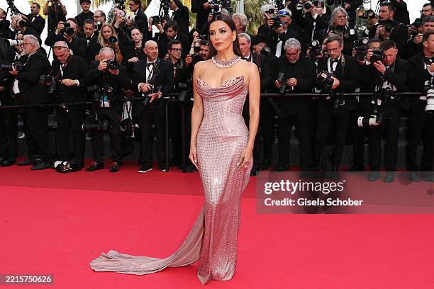Eva Longoria attends the "The Phoenician Scheme" red carpet at the 78th annual Cannes Film Festival at Palais des Festivals on May 18, 2025 in...