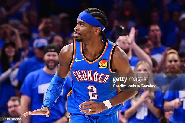 Shai Gilgeous-Alexander of the Oklahoma City Thunder reacts after scoring during the fourth quarter of a game against the Denver Nuggets in Game...