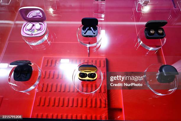Several Bluetooth earbuds powered by Snapdragon are displayed together in the Qualcomm pavilion during the Mobile World Congress 2025 in Barcelona,...