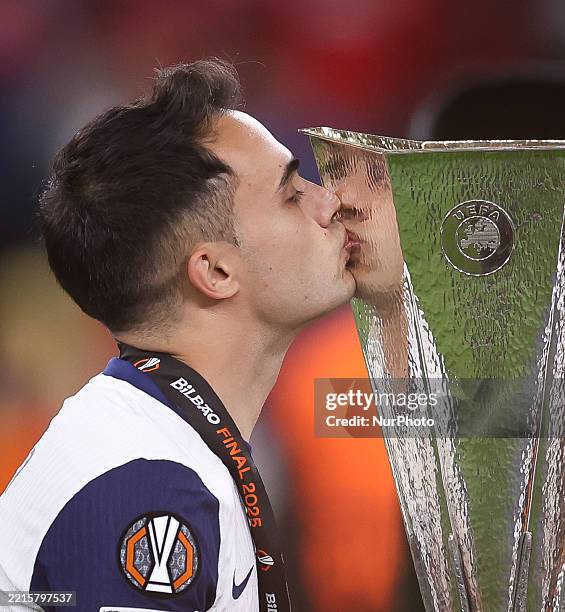 Sergio Reguilon of Tottenham Hotspur kisses the trophy at the end of the UEFA Europa League Final match between Tottenham Hotspur and Manchester...