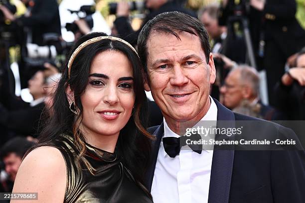 Rudi Garcia and Francesca Brienza attend the "The Phoenician Scheme" red carpet at the 78th annual Cannes Film Festival at Palais des Festivals on...