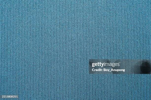 full frame shot of light blue polyester cloth texture and background. - carpet weaving stock pictures, royalty-free photos & images