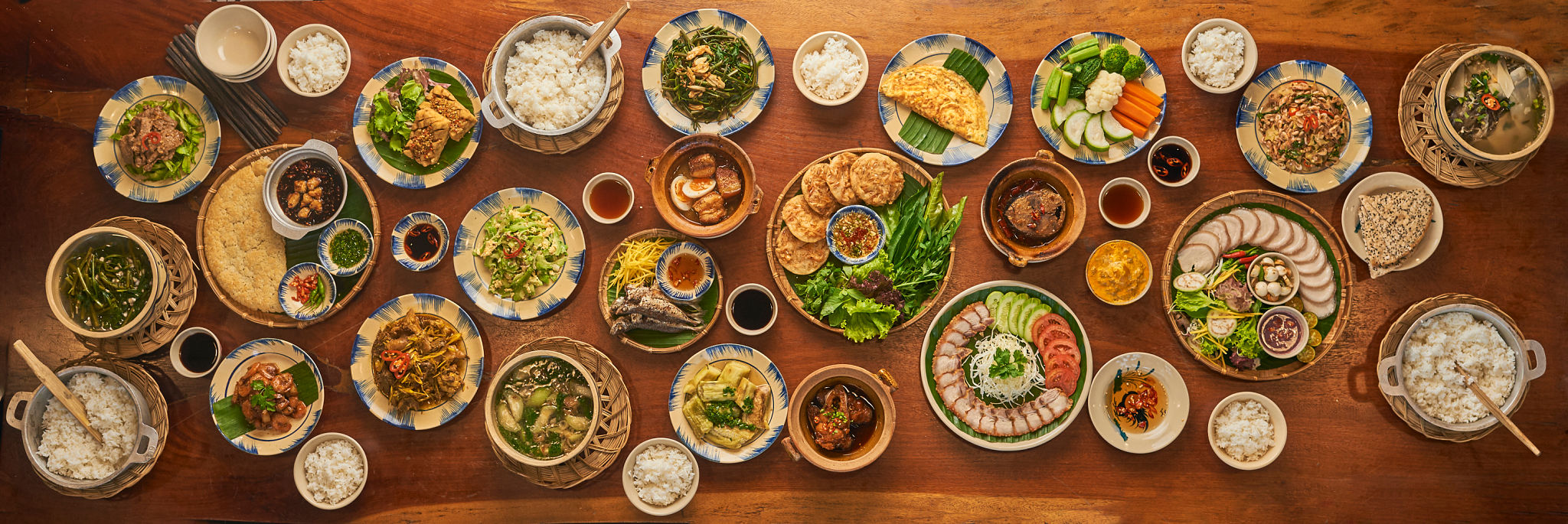 Topshot of large table vietnamese traditional food Topshot of large table vietnamese traditional food