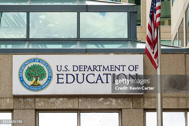 Department of Education sign is displayed outside of their federal student aid office on May 18, 2025 in Washington, DC.