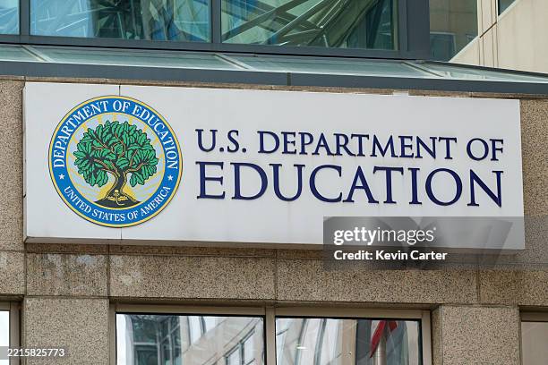 Department of Education sign is displayed outside of their federal student aid office on May 18, 2025 in Washington, DC.