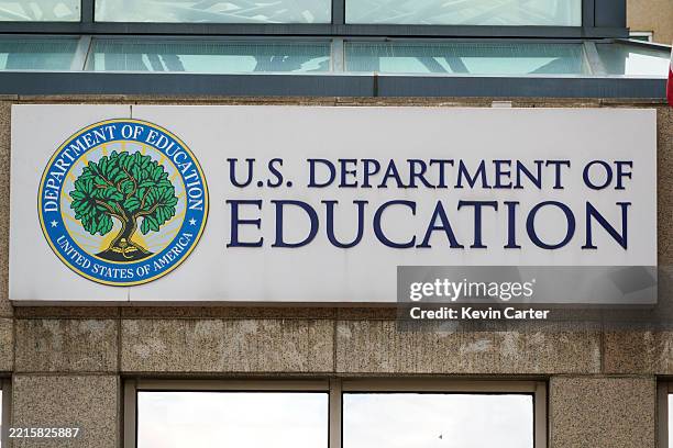 Department of Education sign is displayed outside of their federal student aid office on May 18, 2025 in Washington, DC.