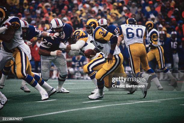 The Los Angeles Rams' Elvis Peacock running with the ball in the first half of a game against the Buffalo Bills at Rich Stadium, Orchard Park, New...
