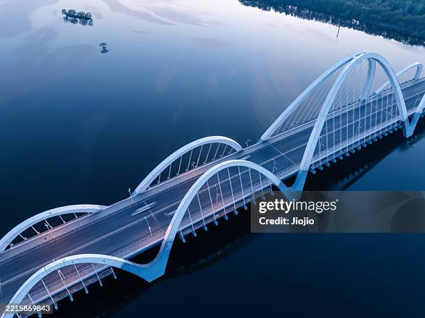 modern bridge at dusk - bridge architecture up close night stock pictures, royalty-free photos & images