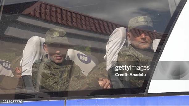 Screen capture from a video shows Russian soldiers are returned to Russia after the Russian Defense Ministry announced on Friday that Moscow and Kyiv...