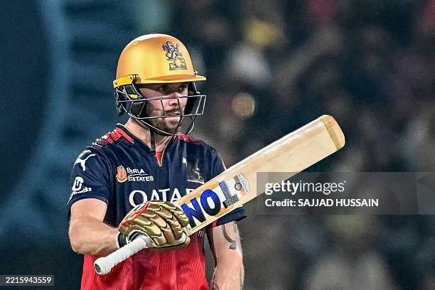 Royal Challengers Bengaluru's Phil Salt celebrates after scoring a half-century during the Indian Premier League Twenty20 cricket match between Royal...