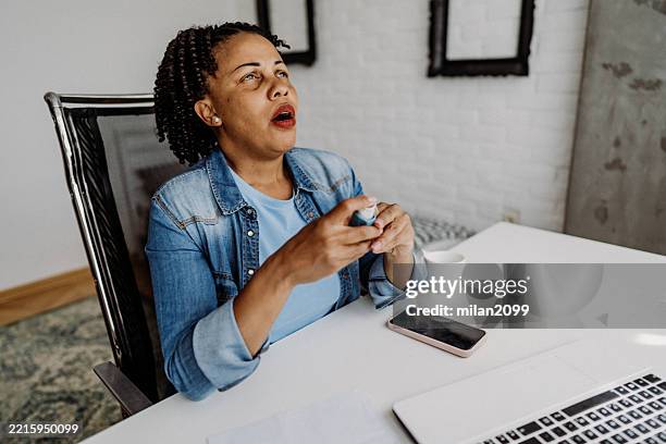 asthma inhaler - bronchitis stock pictures, royalty-free photos & images