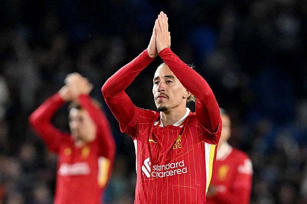 Kostas Tsimikas of Liverpool acknowledges the fans after the Premier League match between Brighton & Hove Albion FC and Liverpool FC at Amex Stadium...