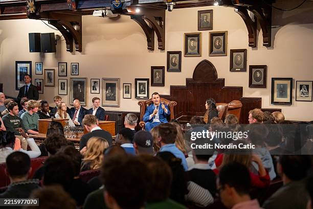 Charlie Kirk speaks at The Cambridge Union on May 19, 2025 in CAMBRIDGE, UNITED KINGDOM.