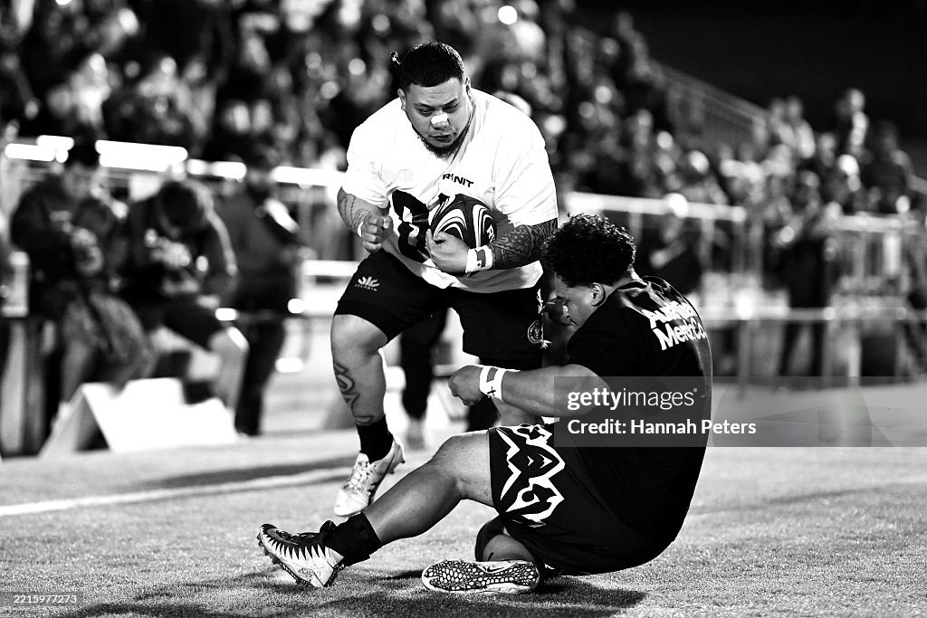Runitu Ala Kaufana competes against Tapinga Junior Fahiua during the RUNIT ...