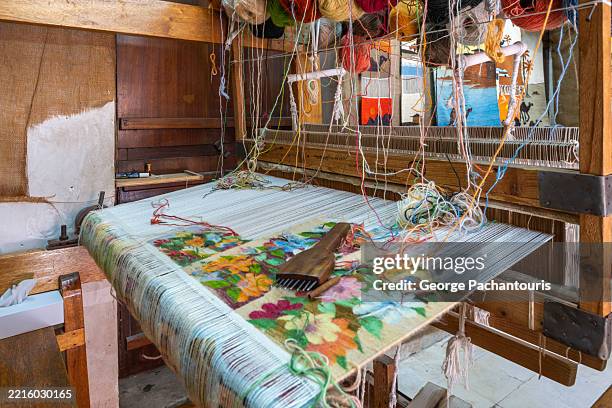 traditional weaving loom with floral fabric - webstuhl stock-fotos und bilder