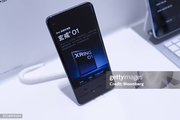 Xiaomi Corp. 15S Pro smartphone equipped with the Xring 01 chip on display at the company's store in Shanghai, China, on Saturday, May 24, 2025....