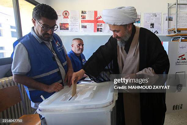 Man casts his vote at a polling station in the municipal elections in Nabatieh in southern Lebanon on May 24, 2025. Despite a rise in Israeli strikes...
