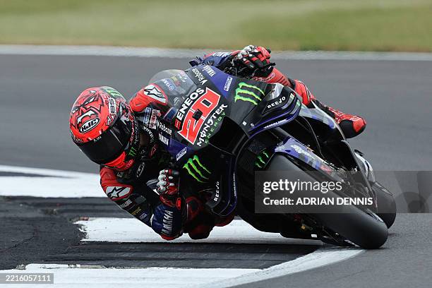 Monster Energy Yamaha MotoGP team's French MotoGP rider Fabio Quartararo takes part in a qualifying session of the MotoGP British Grand Prix at...