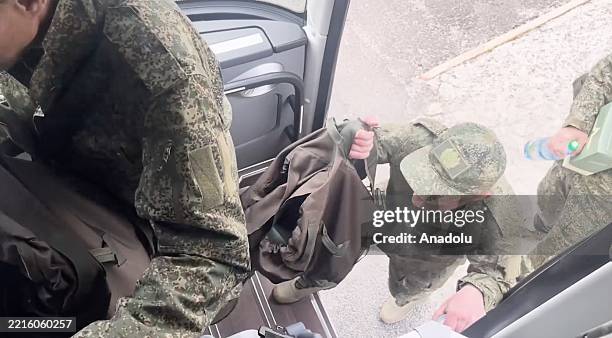 Screen capture from a video shows 307 Russian servicemen in captivity being returned while 307 servicemen were transferred from the Armed Forces of...