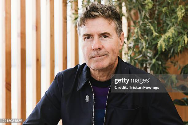 Dion Beebe poses during a portrait session for the 2025 Pierre Angénieux Tribute at the 78th annual Cannes Film Festival at the Plage des Palmes on...