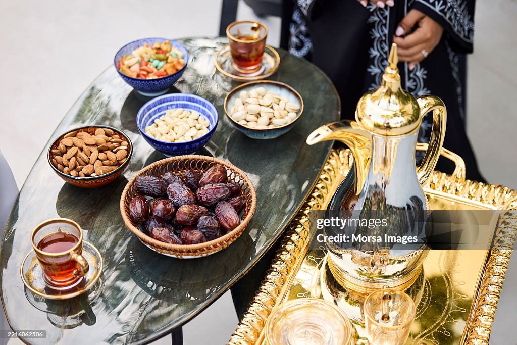 Traditional dates and nuts arranged on table