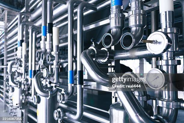 old brewery with stainless steel equipment - ventil stock-fotos und bilder