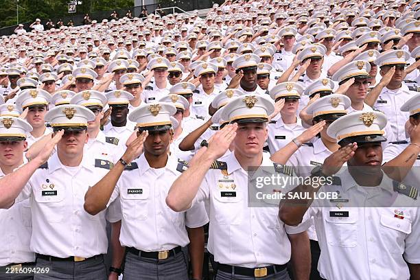 Military Academy cadets listen to US President Donald Trump deliver the commencement address at the 2025 graduation ceremony at the US Military...