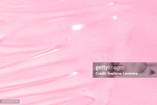 close-up of smooth pink texture with glossy surface highlights and delicate bubbles - all over pattern stock pictures, royalty-free photos & images