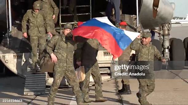 Screen capture from a video shows 307 Russian servicemen in captivity being returned while 307 servicemen were transferred from the Armed Forces of...
