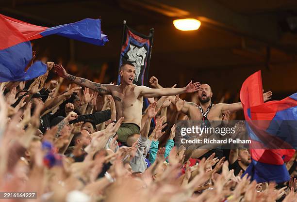 Crystal Palace fans singing at the Holmesdale road stand during the Premier League match between Crystal Palace FC and Wolverhampton Wanderers FC at...