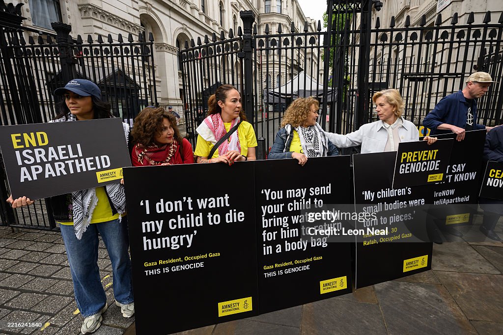Artists And Amnesty International Campaigners Demonstrate Outside Downing Street Against War In Gaza