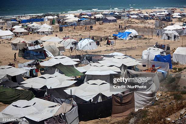 Tents are set up for displaced Palestinians along the beach near the port in Gaza City, Palestine, on May 25, 2025.
