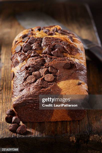 chocolate marble pound cake - chocolate chip bundt cake stock pictures, royalty-free photos & images