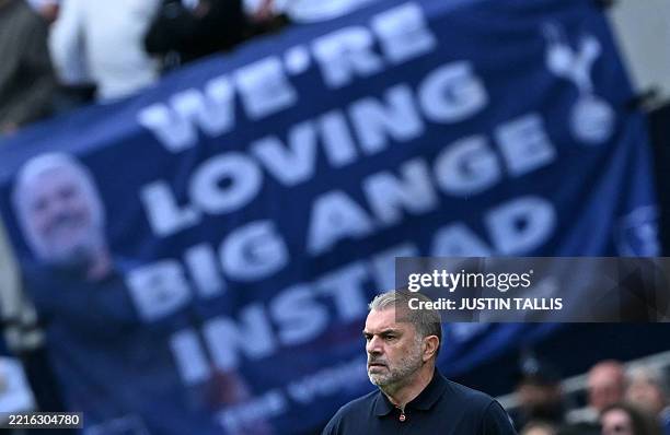 Tottenham Hotspur's Greek-Australian Head Coach Ange Postecoglou watches the players from the touchline during the English Premier League football...