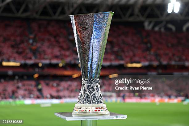 The UEFA Europa League trophy is displayed pitch side on a plinth prior to the UEFA Europa League Final 2025 between Tottenham Hotspur and Manchester...