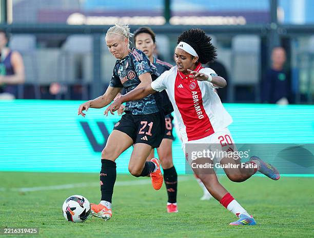 Pernille Harder of Bayern Munich and Lily Yohannes of Ajax compete for the ball during the Group 1 match between Ajax and Bayern Munich in the World...