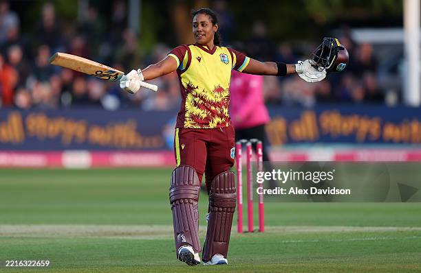 Hayley Matthews of West Indies celebrates reaching her century during the 1st Women's Vitality IT20 between England and West Indies at The Spitfire...