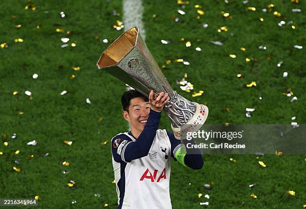Son Heung-Min of Tottenham Hotspur lifts the UEFA Europa League trophy after his team's victory in the UEFA Europa League Final 2025 between...