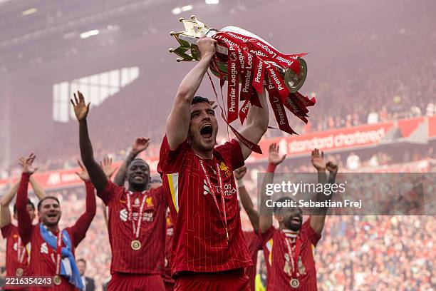 Andrew Robertson celebrates with a trophy as Liverpool are crowned the Champions of the Premier League for the 2024/25 Season, following the Premier...